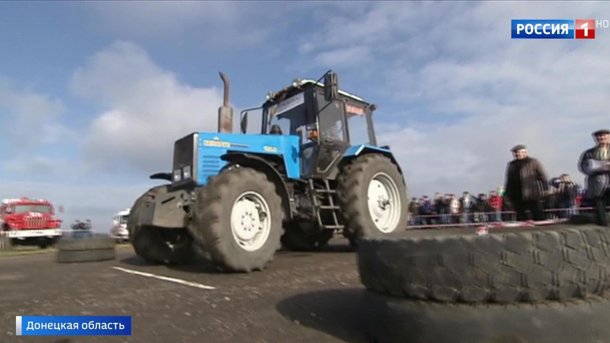 Ukrainians Hide Their Faces as They Secretly Join an Exciting Tractor Race in DNR
