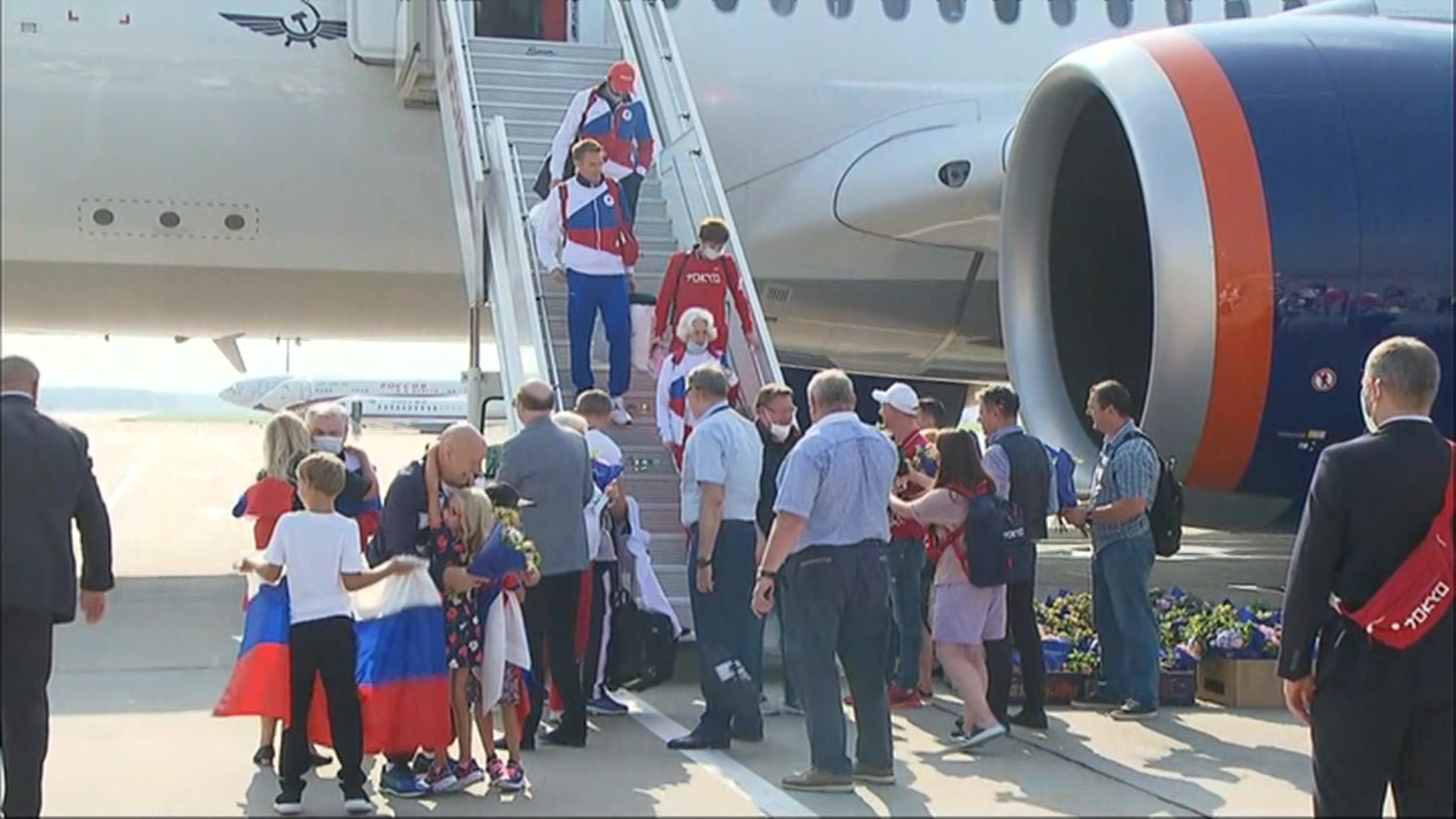 "Золотой рейс": в Москву из Токио возвращаются российские олимпийцы