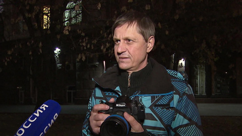 На фотографа напали из-за снимков табло с курсами валют