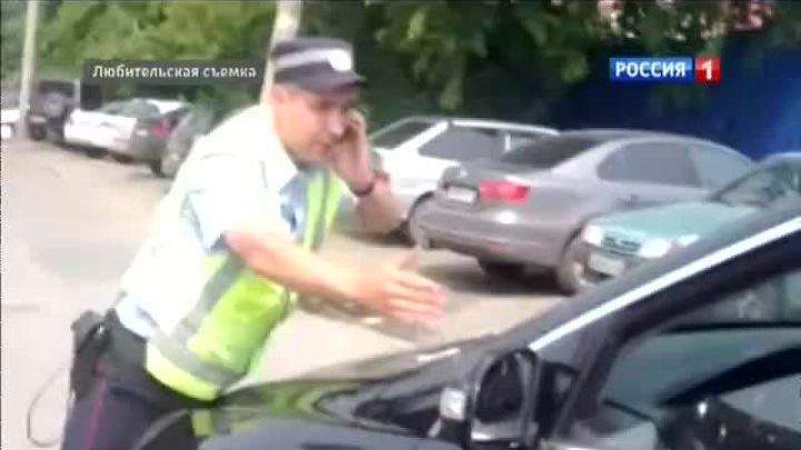 Женщина прокатила автоинспектора на капоте депутатской машины