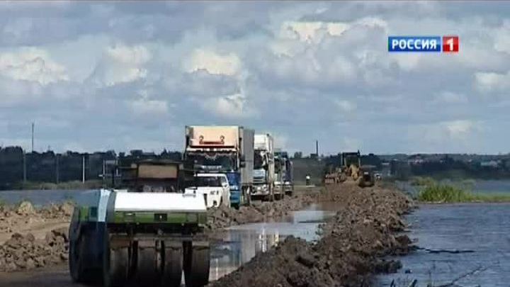 Путин посоветовал чиновникам надеть болотные сапоги и сесть в лодки