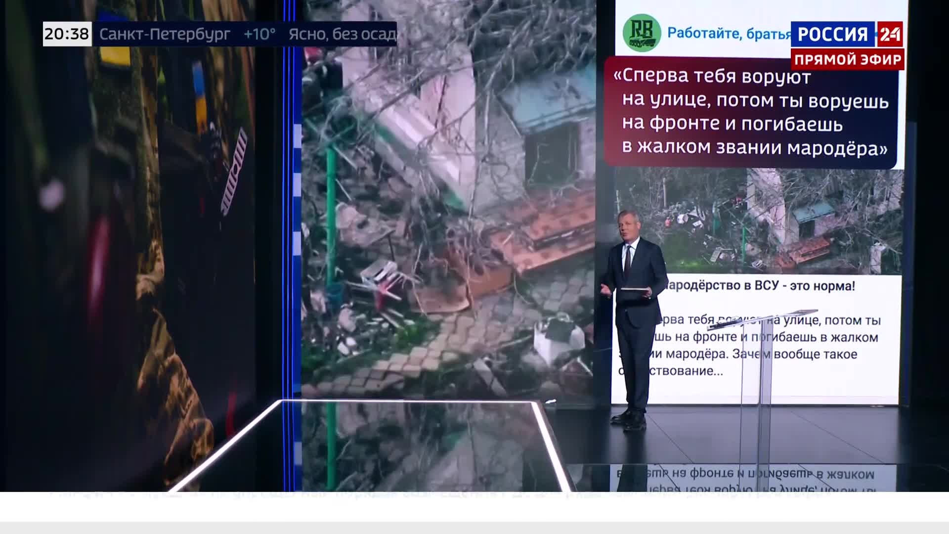 Украинский солдат покидает дом с имуществом.